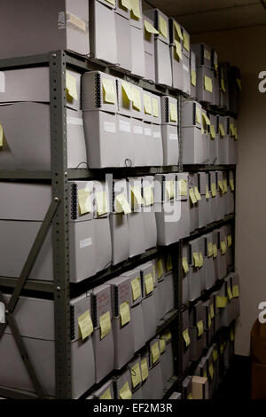 File storage containers stacked in office file room - USA Stock Photo