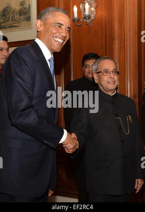 New Delhi. 26th Jan, 2015. U.S. President Barack Obama (L) shakes hands with his Indian counterpart Pranab Mukherjee at Presidential Palace in New Delhi, India, Jan. 25, 2015. U.S. President Barack Obama on Sunday arrived in India for a three-day visit of this country. Credit:  Xinhua/Alamy Live News