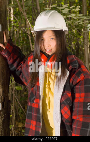 Teenage girl wearing lumber jacket Stock Photo