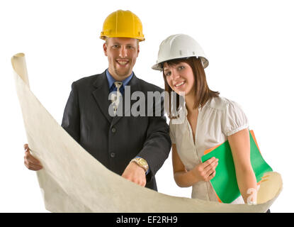 Two architects looking at blueprints Stock Photo