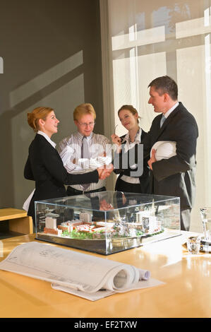 Architect shaking hands with a client Stock Photo