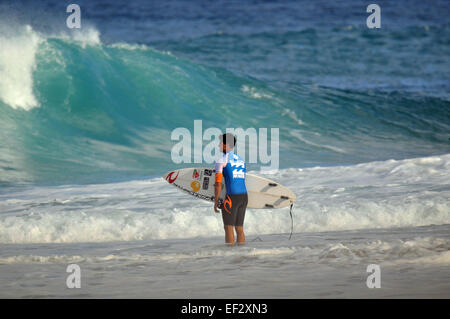 Brazilian pro-surfer, Gabriel Medina, prepares for his heat at the 2014 Pipemasters, Banzai Pipeline, Ehukai Beach Oahu Hawaii Stock Photo