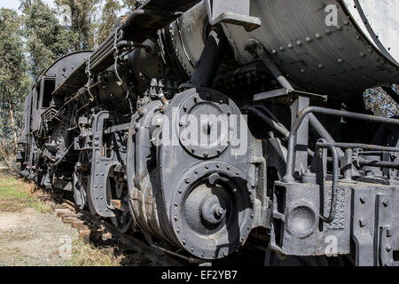 A close up of a black steam powered locomotive. Stock Photo