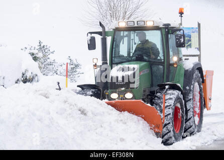 A snowplough removing snow Stock Photo