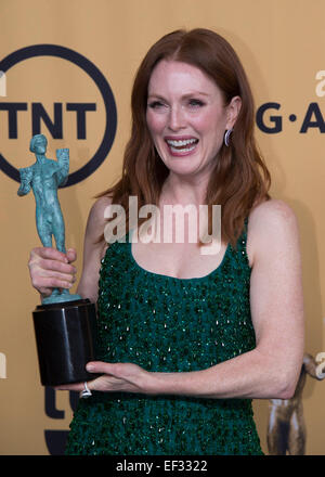 Los Angeles, California, USA. 25th Jan, 2015. Actress Julianne Moore wins the Best Actress In Film at the 21st Annual Screen Actors Guild Awards at the Shrine Auditorium, in Los Angeles, California, on January 25, 2015. © Yang Lei/Xinhua/Alamy Live News Stock Photo