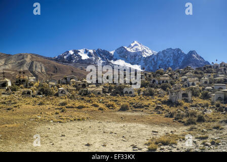 Graveyard with Huayna Potosi mountain in the background, peak in Bolivian Andes Stock Photo