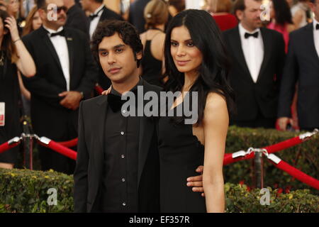 Los Angeles, California, USA. 25th January, 2015. Actor Kunal Nayyar (l) and model Neha Kapur arrive at the 21st annual Screen Actors Guild Awads - SAG Awards - in Los Angeles, USA, on 25 January 2015. Photo: Hubert Boesl /dpa - NO WIRE SERVICE - Credit:  dpa picture alliance/Alamy Live News Stock Photo