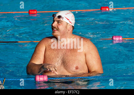 overweight swimmer joins 650 competitors from all over Europe take part in the bi-annual Cold Water Swimming Championships Stock Photo