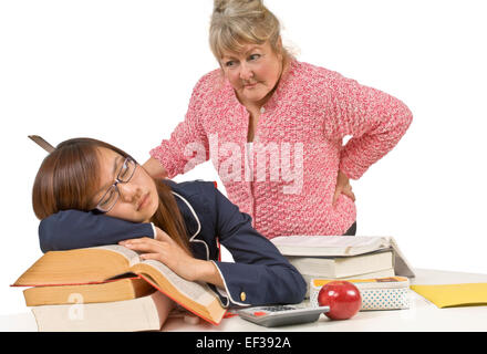Angry teacher looking at sleeping student Stock Photo