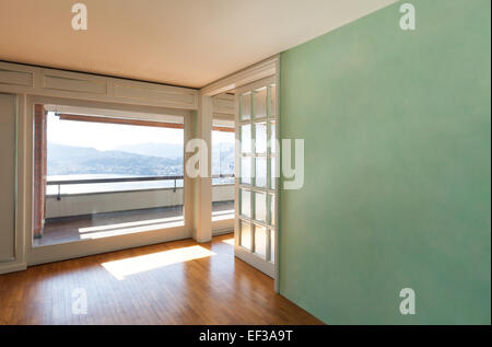 Interior, empty apartment classic, large room with windows Stock Photo