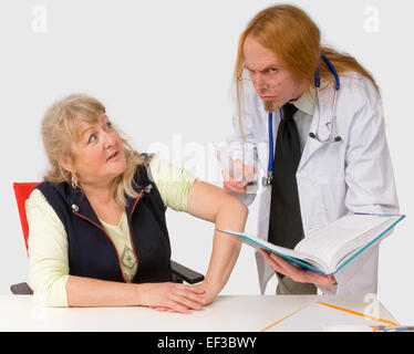 Apprehensive woman looking at Doctor Stock Photo