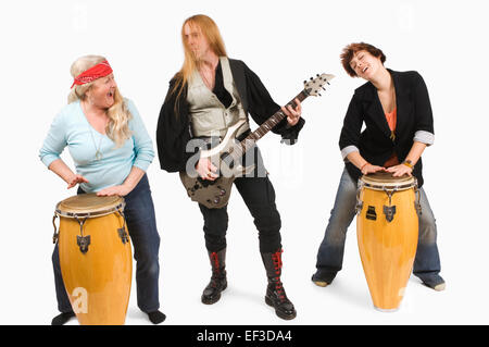 Three people playing instruments Stock Photo