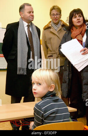 Norwegian parliament head Olemic Thommessen (left), who is visiting the Czech Republic, declined to comment on the case of two sons taken from their Czech parents in 2011 by the Norwegian child welfare service. Thommessen said that this problem should be solved with the Foreign Ministry in Steti, Czech Republic, January 26, 2015 where he visits a press conference focusing on social exclusion and Government agency for social inclusion. Pictured second from right is the Norwegian ambassador to the Czech Republic Siri Ellen Sletner. (CTK Photo/Ondrej Hajek) Stock Photo