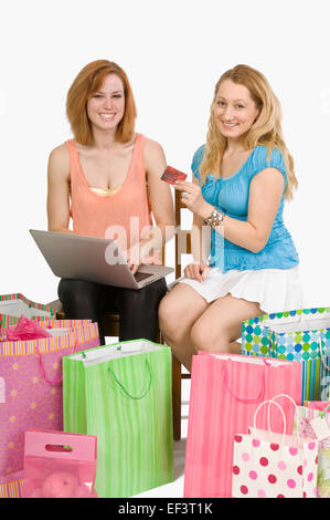 Women shopping online Stock Photo