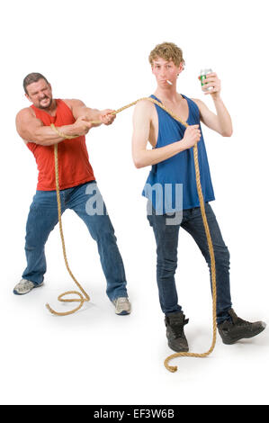 Two men having a tug of war Stock Photo