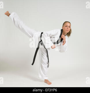 Woman wearing karate uniform Stock Photo