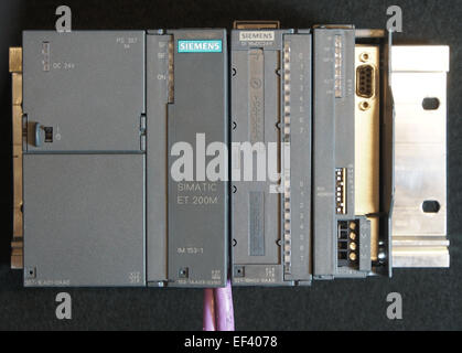 The Siemens PS307 is a programmable controller, part of the ET 200M system, which integrates DI (digital input) and Profibus (communication protocol) for automation and control in industrial settings. Stock Photo
