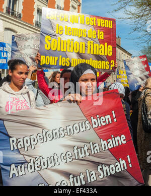 Paris, France, French Arab Muslims Demonstrating against discrimination, Islamophobia, Racism, Veiled Muslim Women in traditional Dress Holding Protest Signs and Banners on Street, muslim france Stock Photo