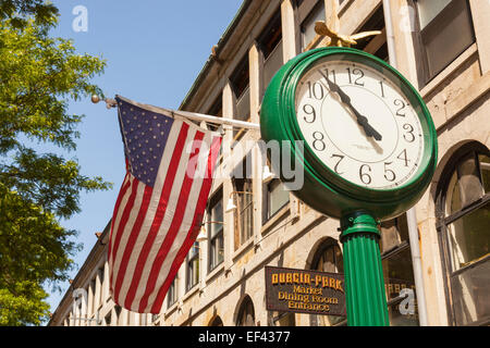 Clock and American flag outside Durgin Park Restaurant, Faneuil Hall Marketplace, Boston, Massachusetts, USA Stock Photo