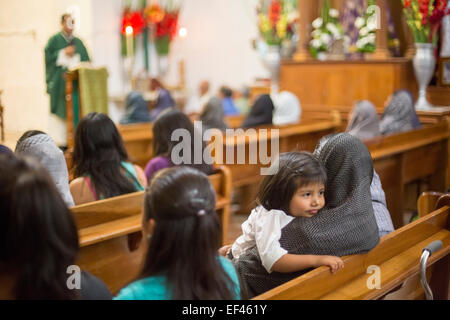 San Sebastian Abasolo, Oaxaca, Mexico - Fr. Victorio Nickolas Velasco celebrates mass at San Sebastian Abasolo Catholic church. Stock Photo