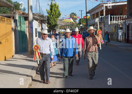 San Sebastian Abasolo, Oaxaca, Mexico - Parishoners walk to the San Sebastian Abasolo Catholic church for mass. Stock Photo