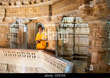 Jaisalmer, Rajasthan, India. Priest on upper level of Jain Temple Stock Photo