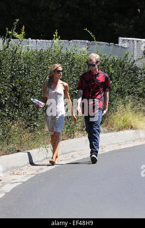 Denise Richards out and about in Beverly Hills wearing a white summer dress and a hair braid  Featuring: Denise Richards Where: Los Angeles, California, United States When: 24 Jul 2014 Stock Photo