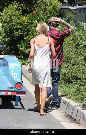 Denise Richards out and about in Beverly Hills wearing a white summer dress and a hair braid  Featuring: Denise Richards Where: Los Angeles, California, United States When: 24 Jul 2014 Stock Photo