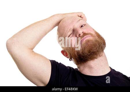 man thinking and scratching his head Stock Photo