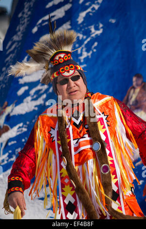 Aboriginal man doing ceremonial dance at a winter festival in Cannington Ontario Stock Photo