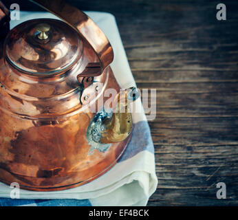 Old copper kettle Stock Photo