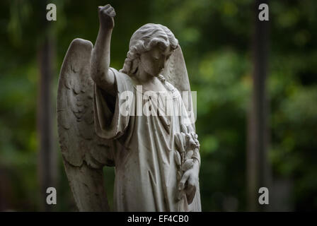 Statue of a grieving angel figure at Taman Prasati museum (museum of memorial stone park) in Jakarta, Indonesia. Stock Photo