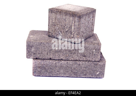 new gray decorative street pavement concrete bricks paving stone isolated on white background Stock Photo
