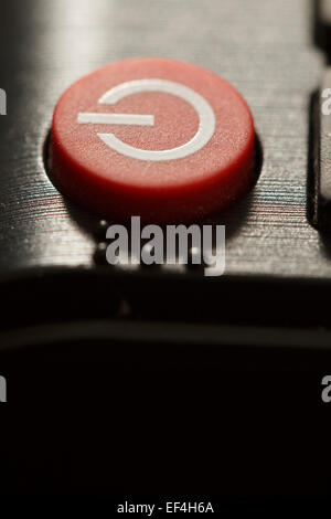 remote control on off button extreme close-up macro shot Stock Photo