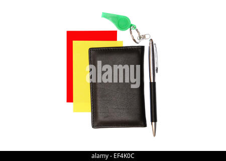 green plastic whistle and red card on white background Stock Photo