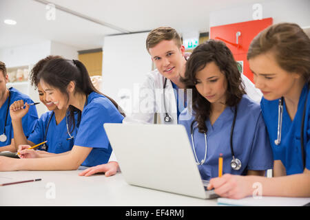 Medical student smiling at the camera during class Stock Photo