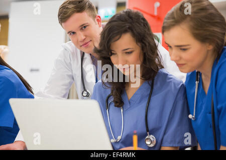 Medical student smiling at the camera during class Stock Photo