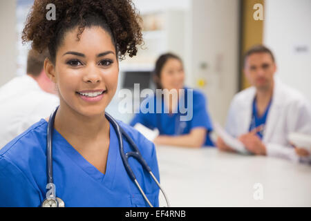 Medical student smiling at the camera during class Stock Photo
