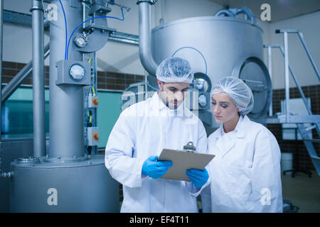Food technicians working together Stock Photo