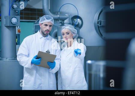 Food technicians working together Stock Photo