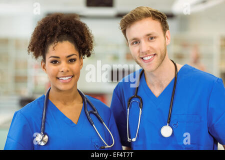 Young medical students smiling at camera Stock Photo