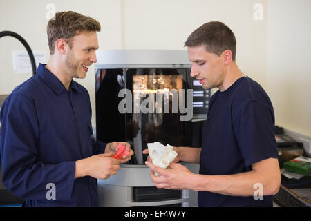 Engineering students using 3d printer Stock Photo