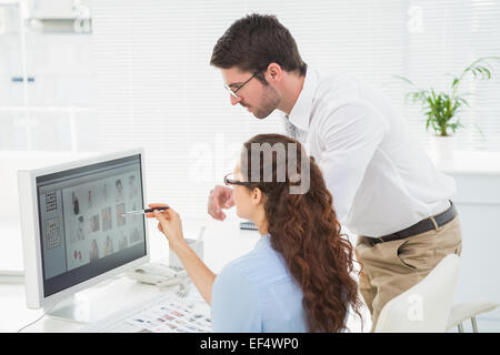 Concentrated business colleagues working on computer Stock Photo