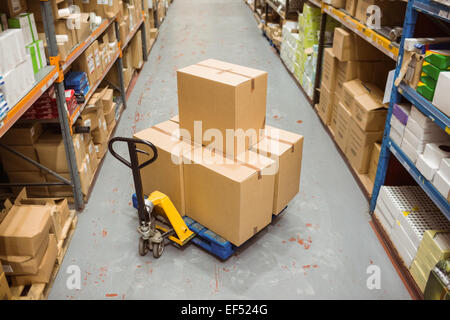 Cardboard boxes in warehouse Stock Photo