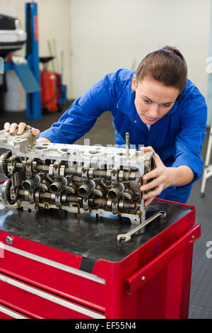 Mechanic working on an engine Stock Photo