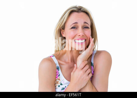 Blonde woman suffering with teeth pain Stock Photo