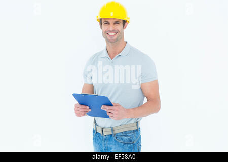 Happy architect holding clip board Stock Photo