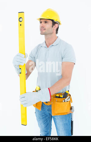 Carpenter using spirit level Stock Photo