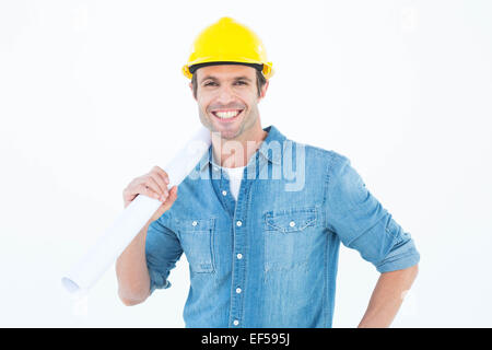 Confident architect holding rolled blueprint Stock Photo