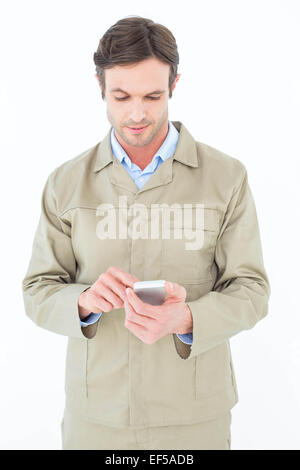 Delivery man using smart phone Stock Photo